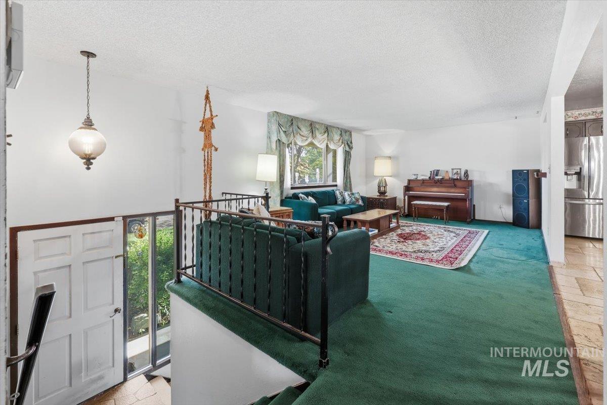10883 W Reutzel Dr., Boise, Idaho 83709, 4 Bedrooms, 2 Bathrooms, Residential For Sale, Price $399,000,MLS 98984301