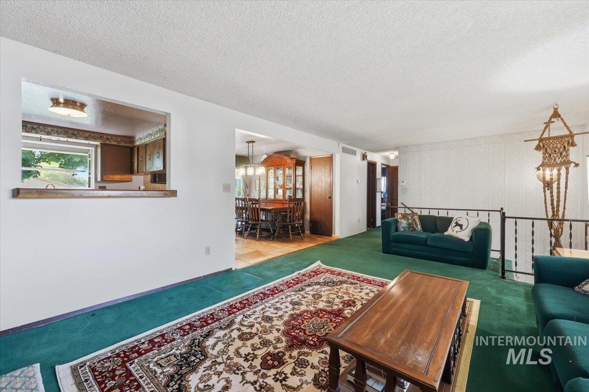 10883 W Reutzel Dr., Boise, Idaho 83709, 4 Bedrooms, 2 Bathrooms, Residential For Sale, Price $399,000,MLS 98984301