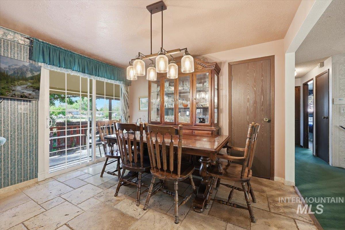 10883 W Reutzel Dr., Boise, Idaho 83709, 4 Bedrooms, 2 Bathrooms, Residential For Sale, Price $399,000,MLS 98984301