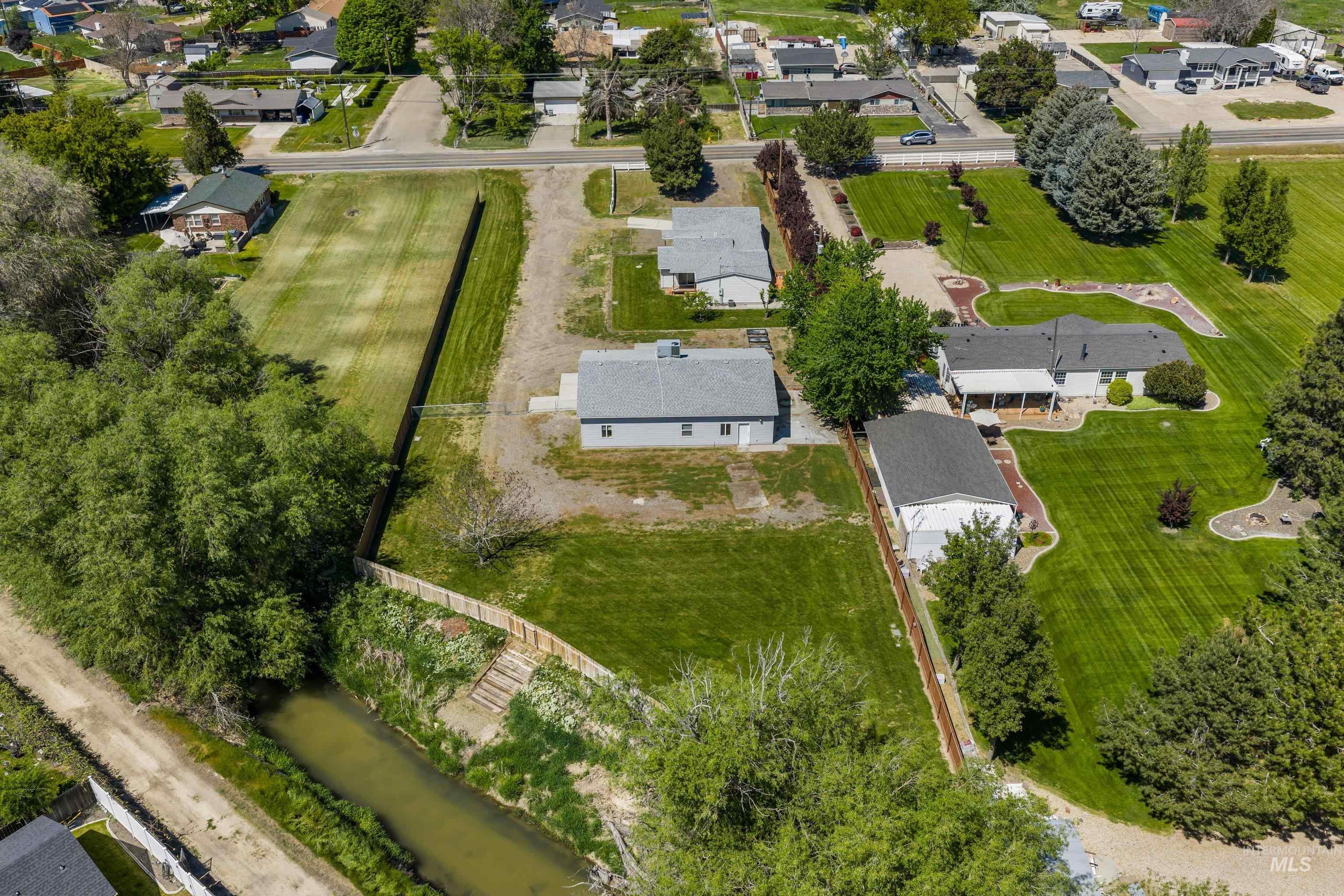11761 Moss Ln., Nampa, Idaho 83651, 3 Bedrooms, 2 Bathrooms, Residential For Sale, Price $589,900,MLS 98985400