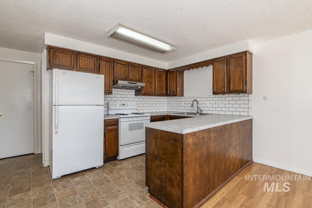 1824 Poplar St., Caldwell, Idaho 83605, 3 Bedrooms, 1.5 Bathrooms, Residential Income For Sale, Price $549,900,MLS 98985590