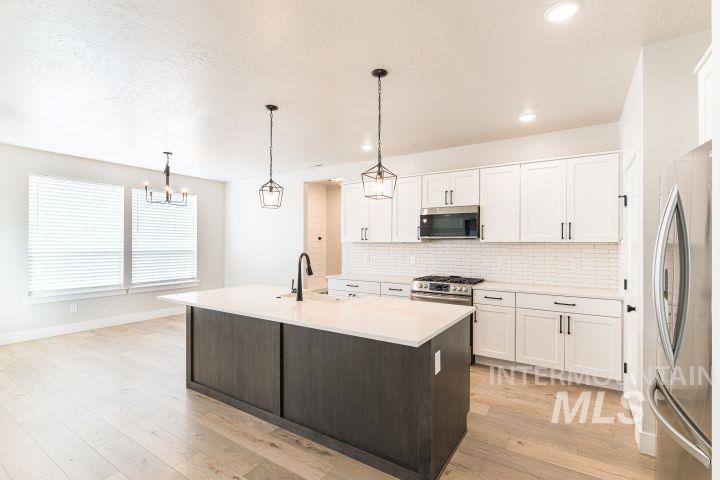 6941 S Sunfish Way, Boise, Idaho 83709, 5 Bedrooms, 2.5 Bathrooms, Residential For Sale, Price $589,999,MLS 98986227
