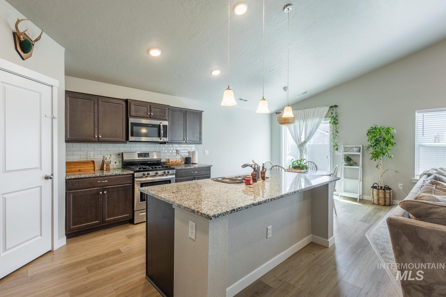 12623 Shadow Peak St., Caldwell, Idaho 83607, 4 Bedrooms, 2 Bathrooms, Residential For Sale, Price $422,000, 98986604