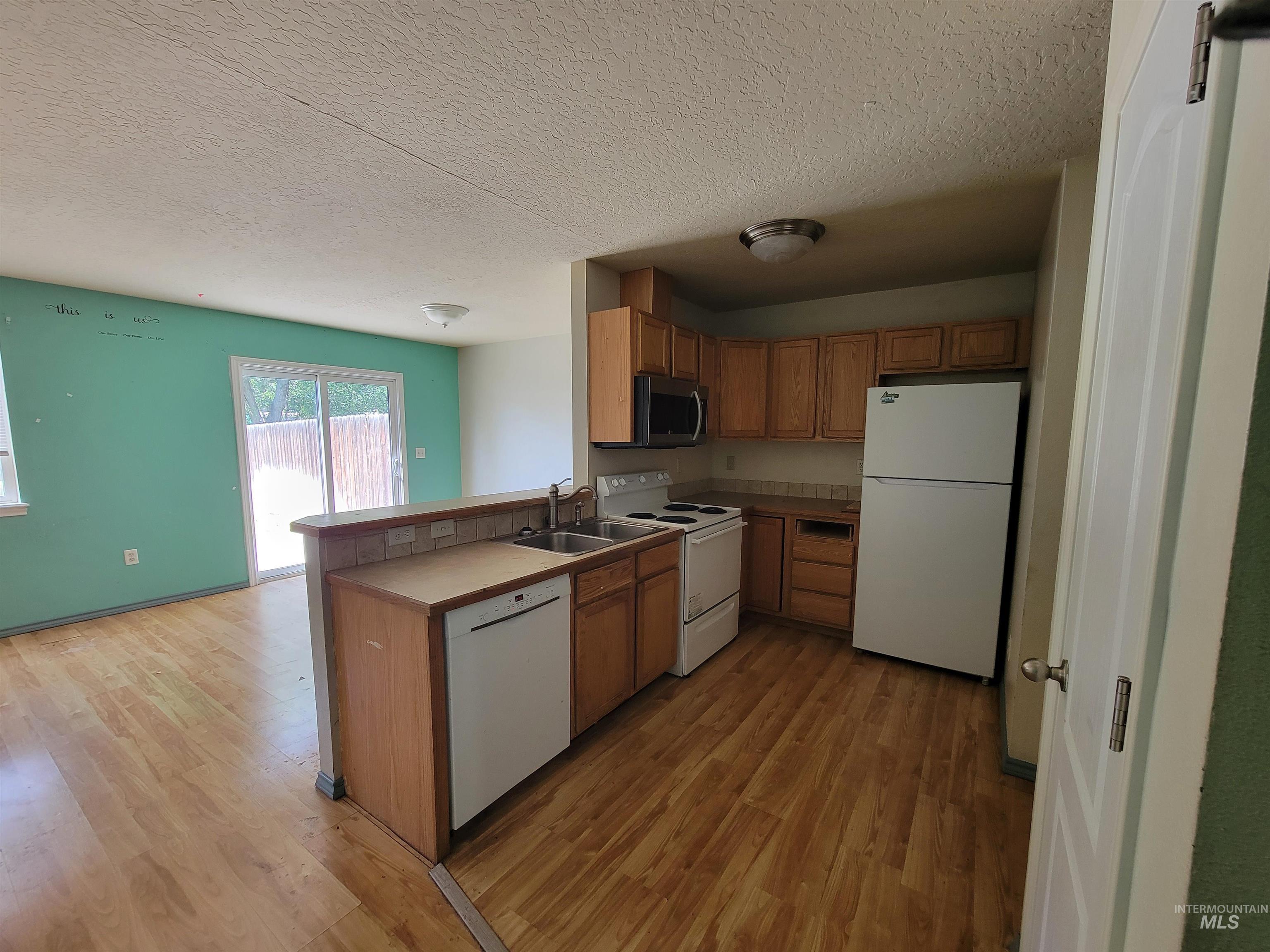217 & 219 20Th Ave N, Nampa, Idaho 83687-4455, 3 Bedrooms, 1.5 Bathrooms, Residential Income For Sale, Price $649,000,MLS 98986615