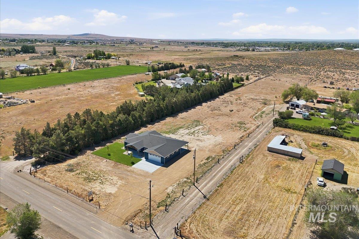 925 NE Beaman Rd., Mountain Home, Idaho 83647, 4 Bedrooms, 2.5 Bathrooms, Residential For Sale, Price $715,000, 98986755