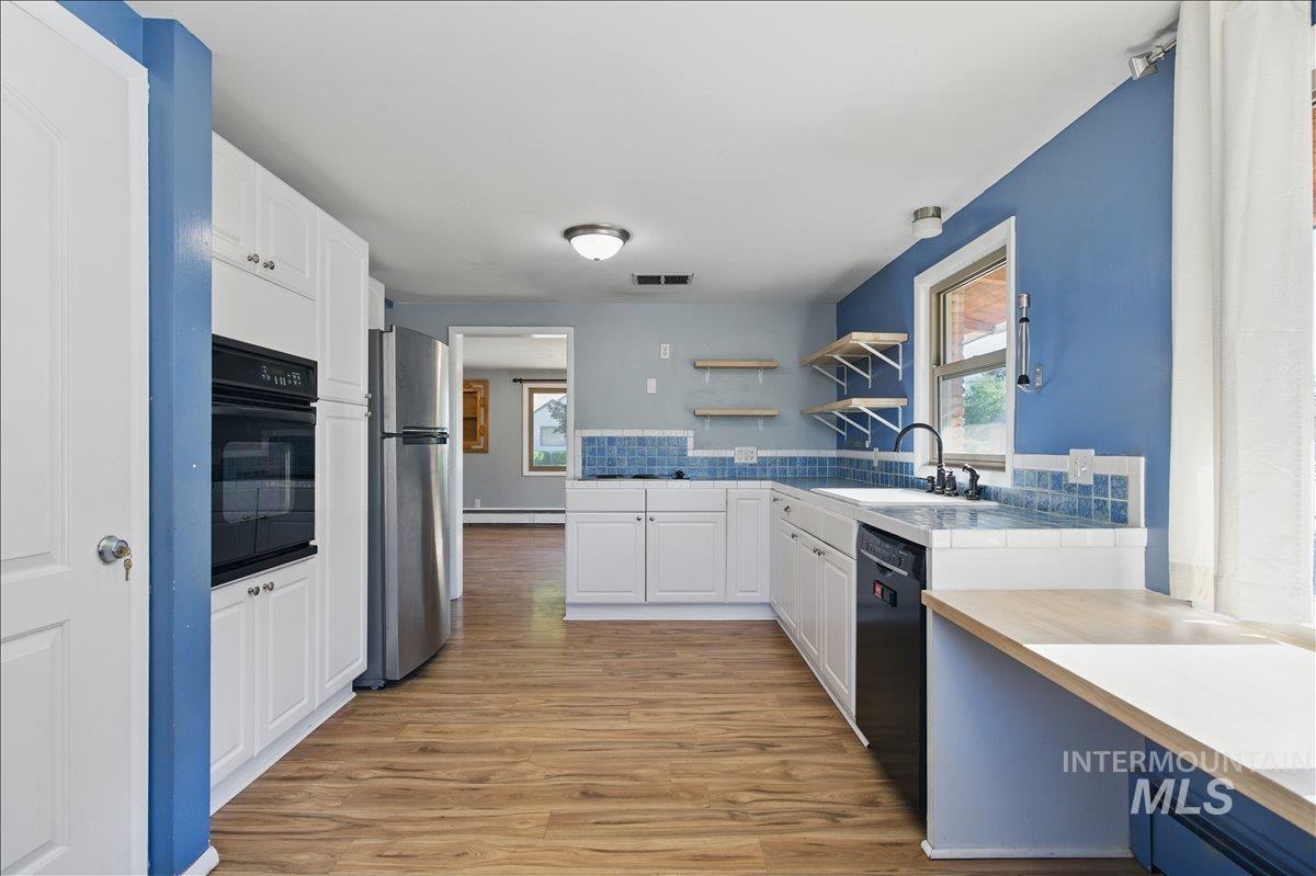 303 W Pine Ave, Meridian, Idaho 83642, 2 Bedrooms, 1 Bathroom, Residential Income For Sale, Price $470,000, 98986815