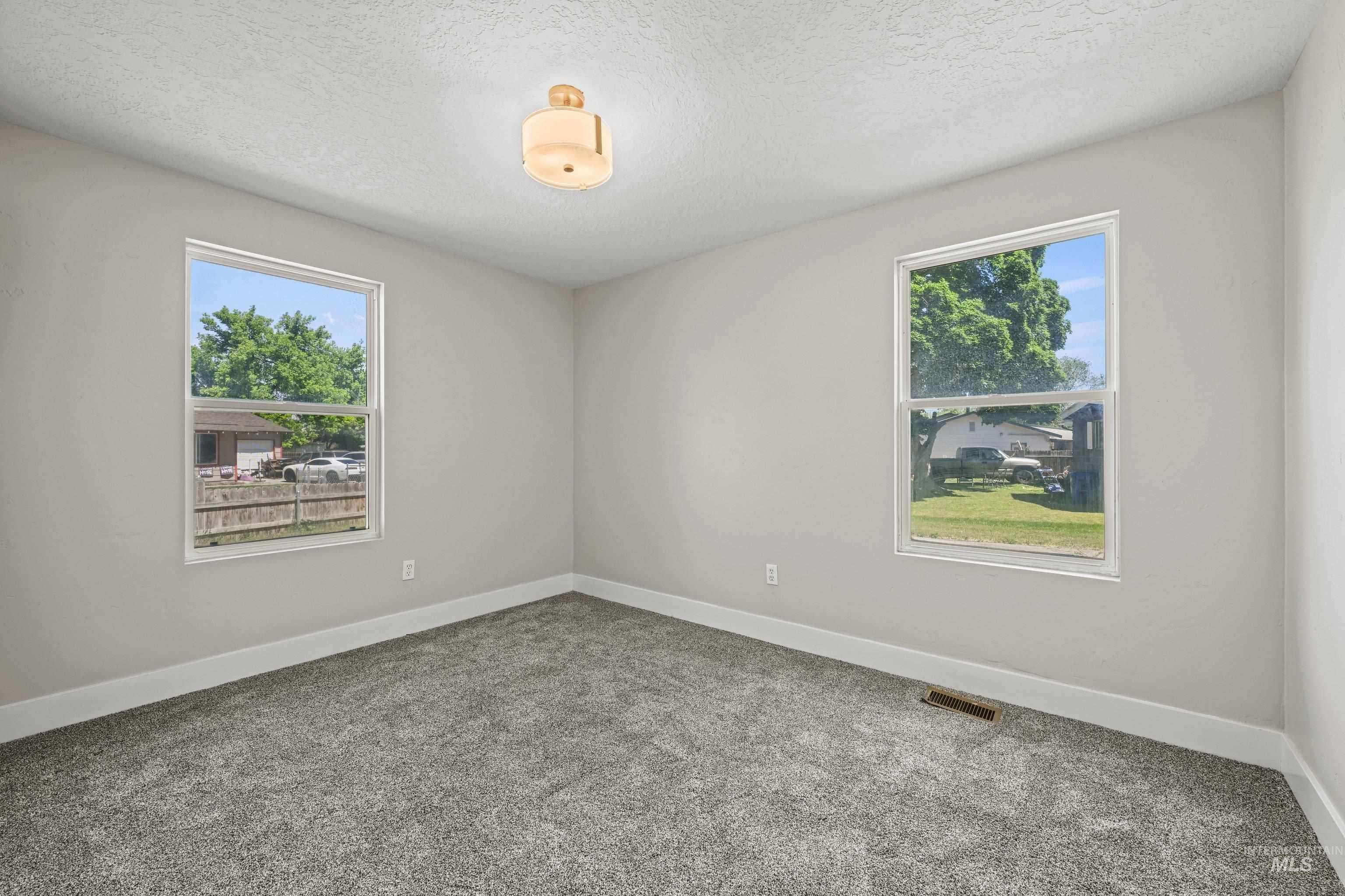 702 18th Ave. N, Nampa, Idaho 83687, 3 Bedrooms, 1.5 Bathrooms, Residential For Sale, Price $325,000,MLS 98986837