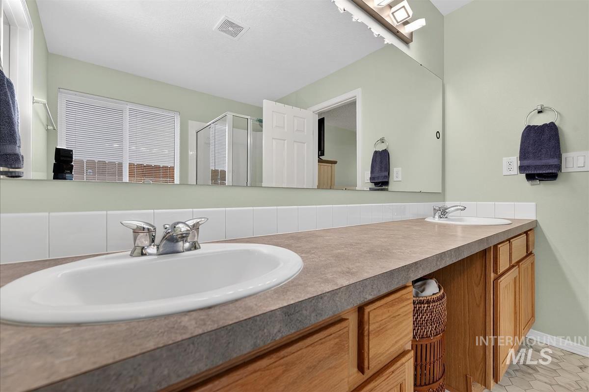 12518 W Abram Drive, Boise, Idaho 83713, 5 Bedrooms, 2.5 Bathrooms, Residential For Sale, Price $599,000,MLS 98987080