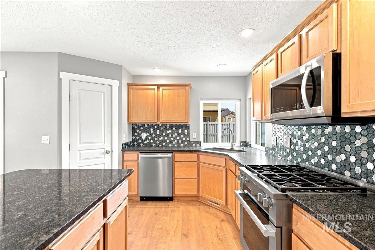 1760 N Bisque Avenue, Kuna, Idaho 83634, 5 Bedrooms, 2.5 Bathrooms, Residential For Sale, Price $549,000, 98987288