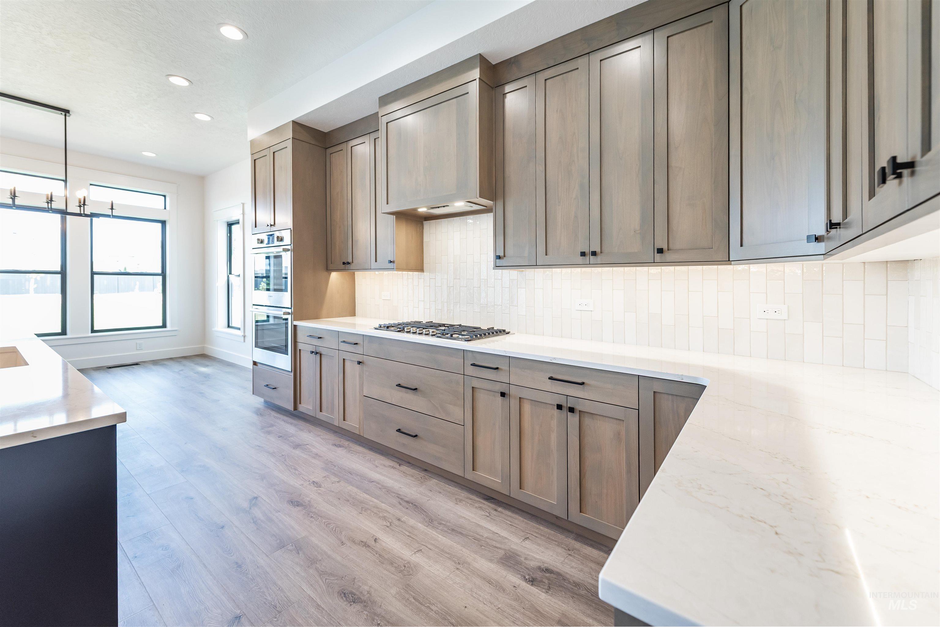 7214 E Merlin Hawk Ct., Nampa, Idaho 83686, 4 Bedrooms, 2.5 Bathrooms, Residential For Sale, Price $874,900,MLS 98988854