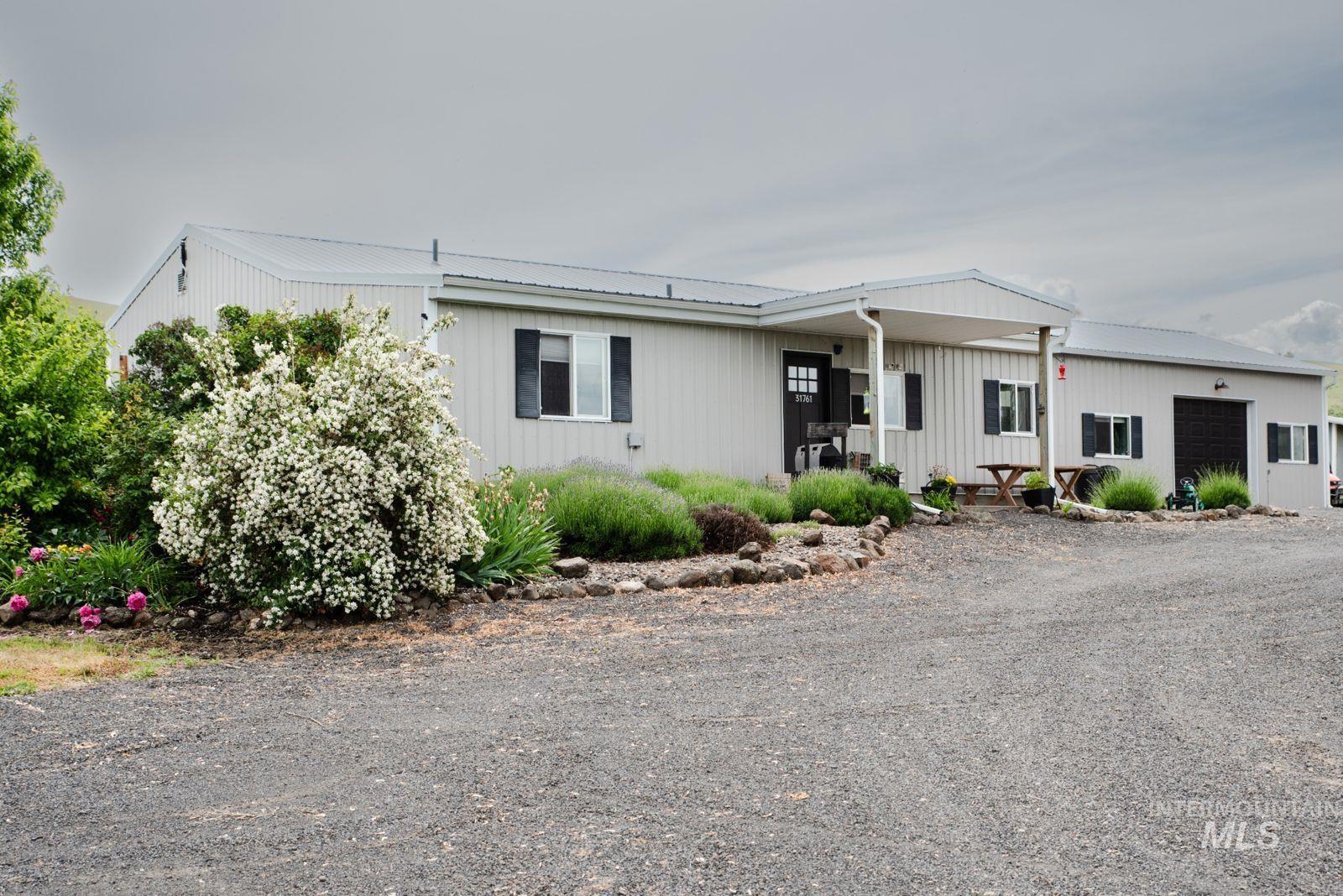 31761 Lonesome Hollow Ln, Lapwai, Idaho 83540, 4 Bedrooms, 2.5 Bathrooms, Residential For Sale, Price $637,250,MLS 98989640