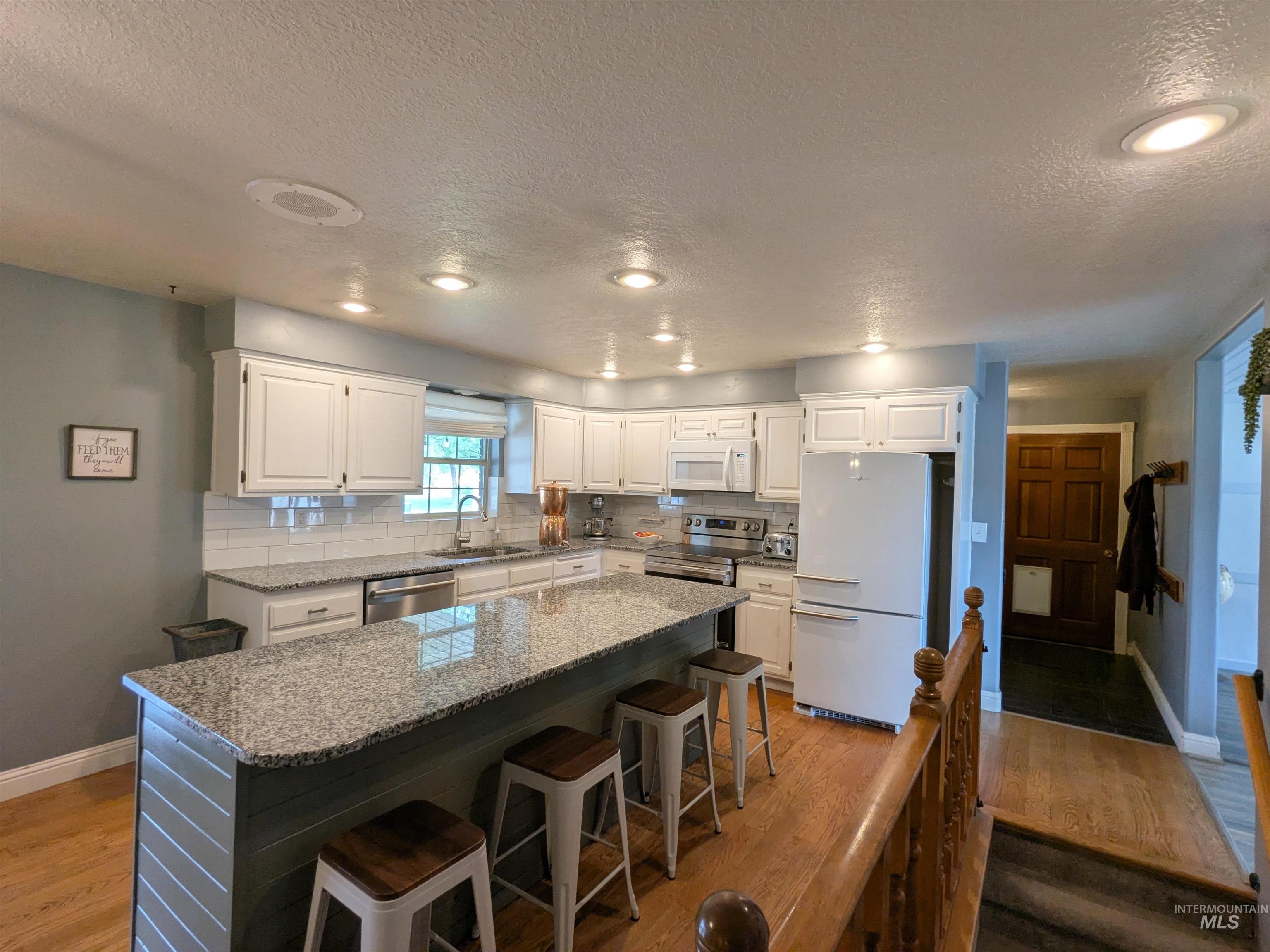 8709 W Ben Ct, Boise, Idaho 83714, 4 Bedrooms, 2 Bathrooms, Residential For Sale, Price $599,000,MLS 98990888