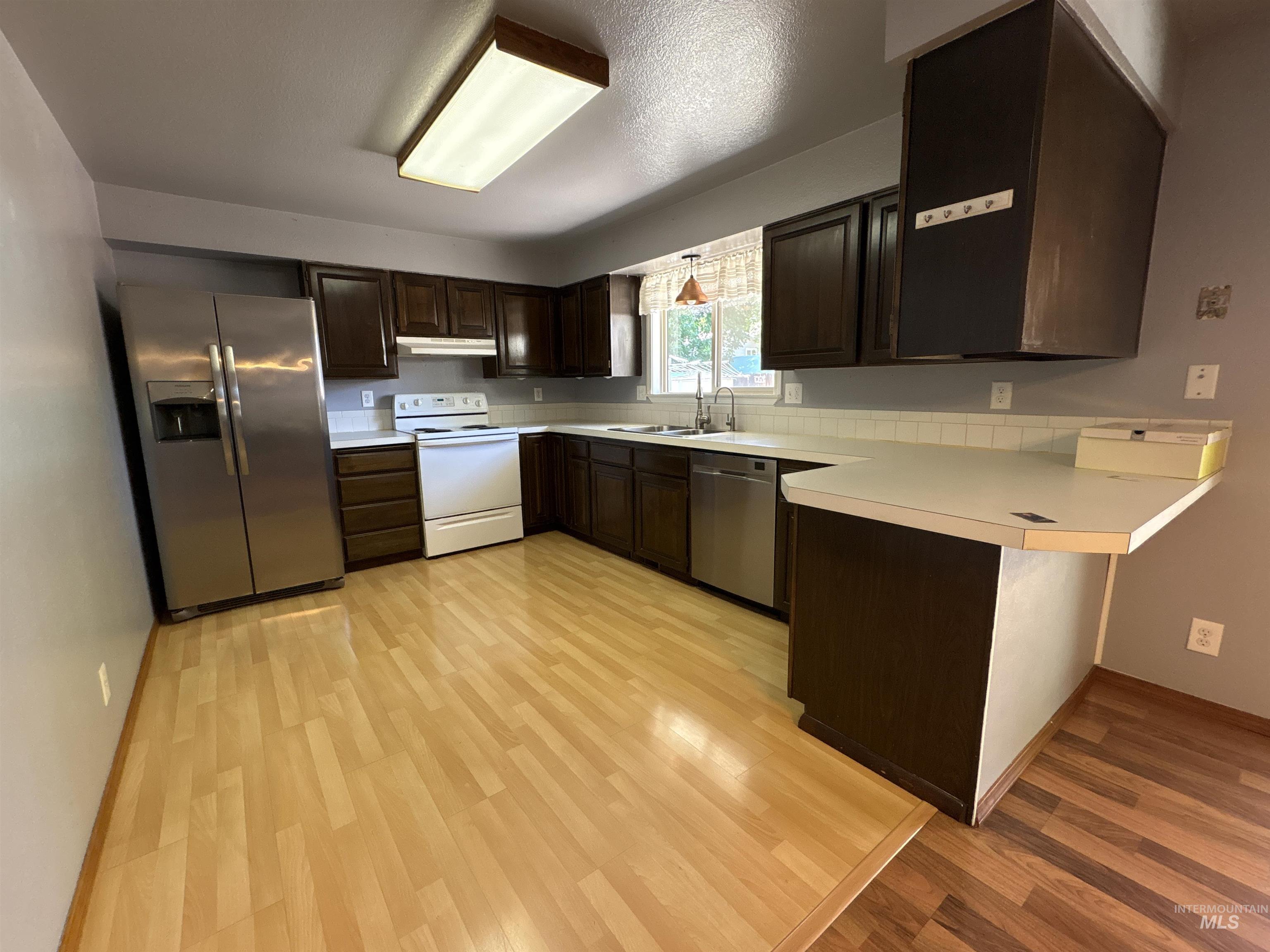 1220 E 9th N, Mountain Home, Idaho 83647-2319, 3 Bedrooms, 2 Bathrooms, Residential For Sale, Price $309,000, 98990946