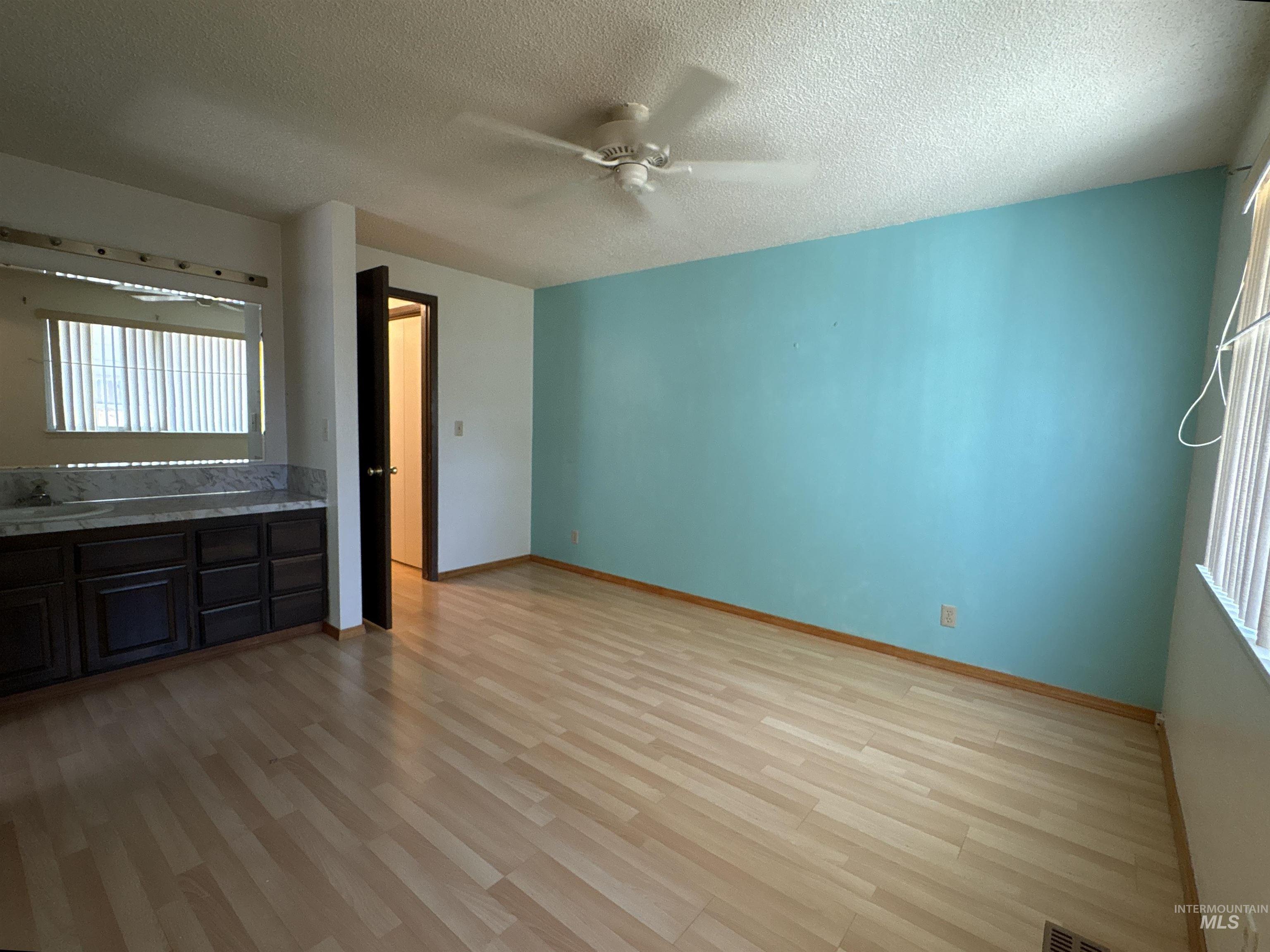 1220 E 9th N, Mountain Home, Idaho 83647-2319, 3 Bedrooms, 2 Bathrooms, Residential For Sale, Price $309,000, 98990946