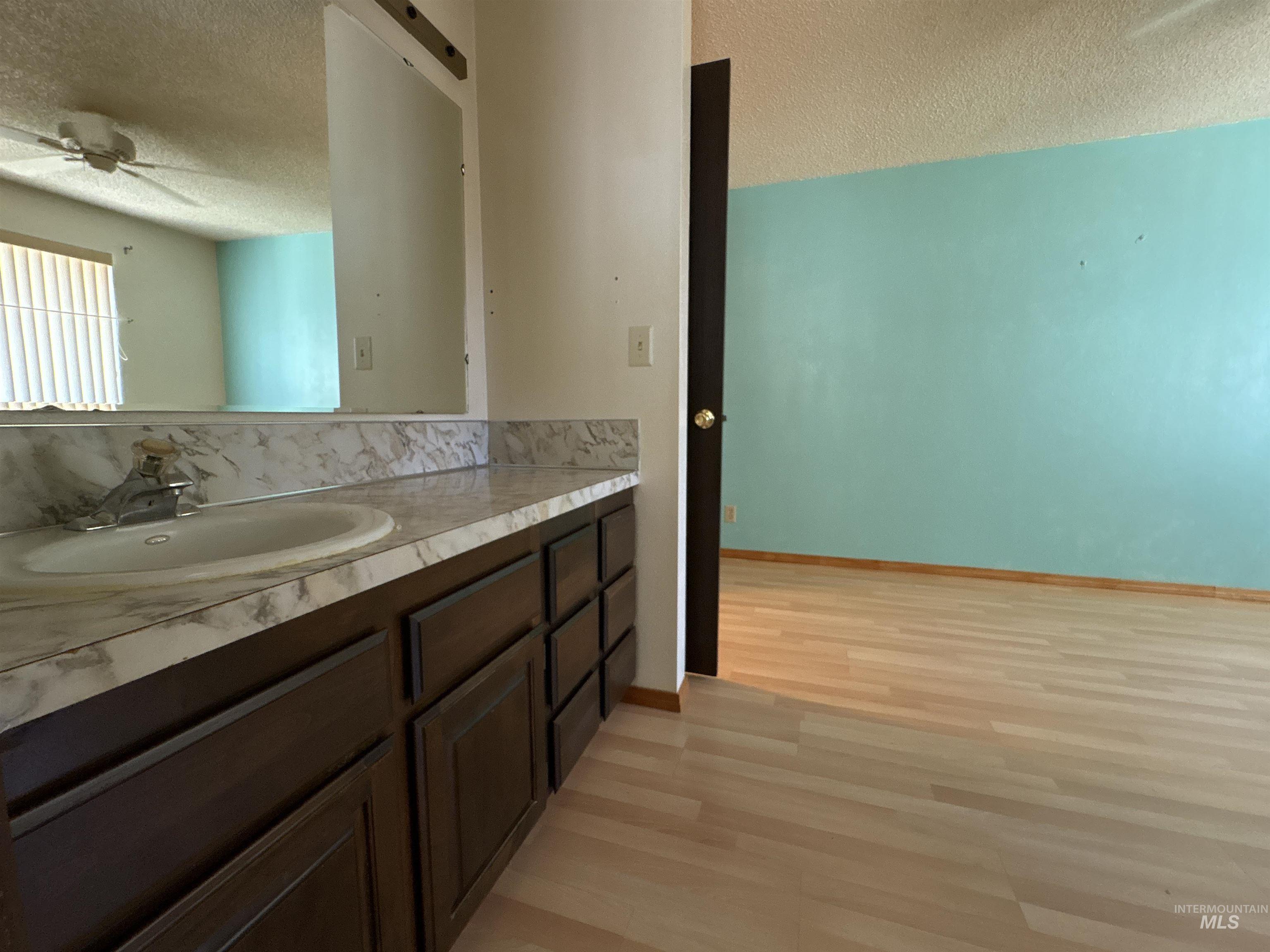 1220 E 9th N, Mountain Home, Idaho 83647-2319, 3 Bedrooms, 2 Bathrooms, Residential For Sale, Price $309,000, 98990946