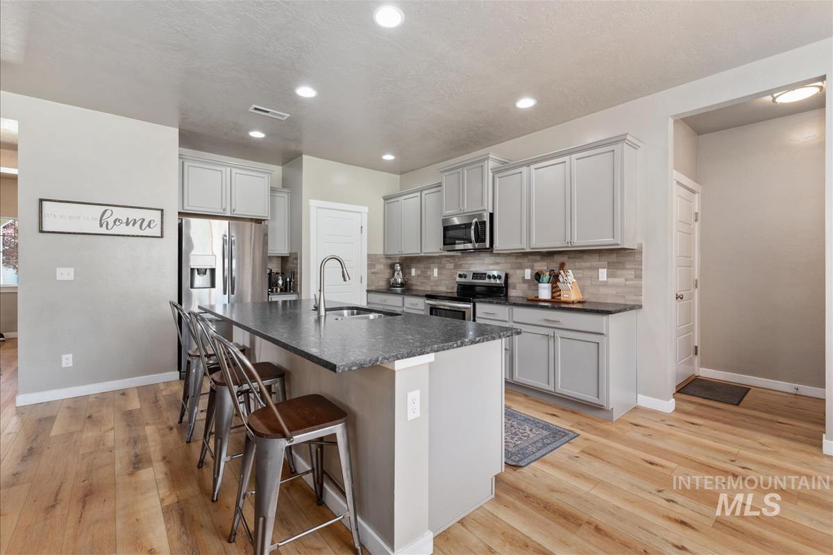 12116 W Ardyce Street, Boise, Idaho 83713, 5 Bedrooms, 2.5 Bathrooms, Residential For Sale, Price $545,000,MLS 98992008