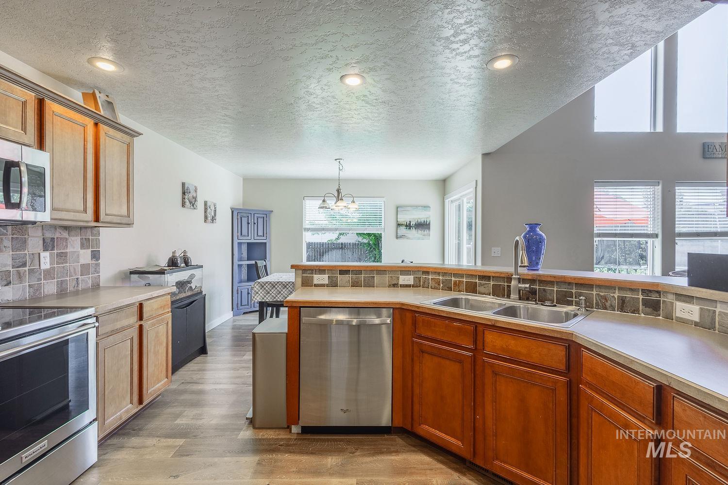 890 N Oxwich Ave, Meridian, Idaho 83642, 5 Bedrooms, 2.5 Bathrooms, Residential For Sale, Price $525,000,MLS 98992609