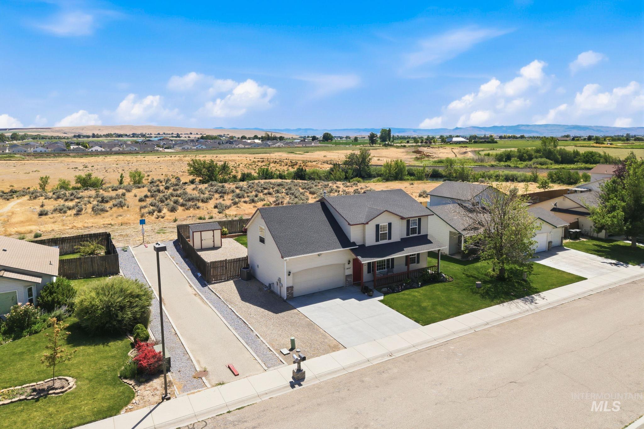 2067 W Hedgerow St, Kuna, Idaho 83634, 4 Bedrooms, 2.5 Bathrooms, Residential For Sale, Price $425,000,MLS 98993277
