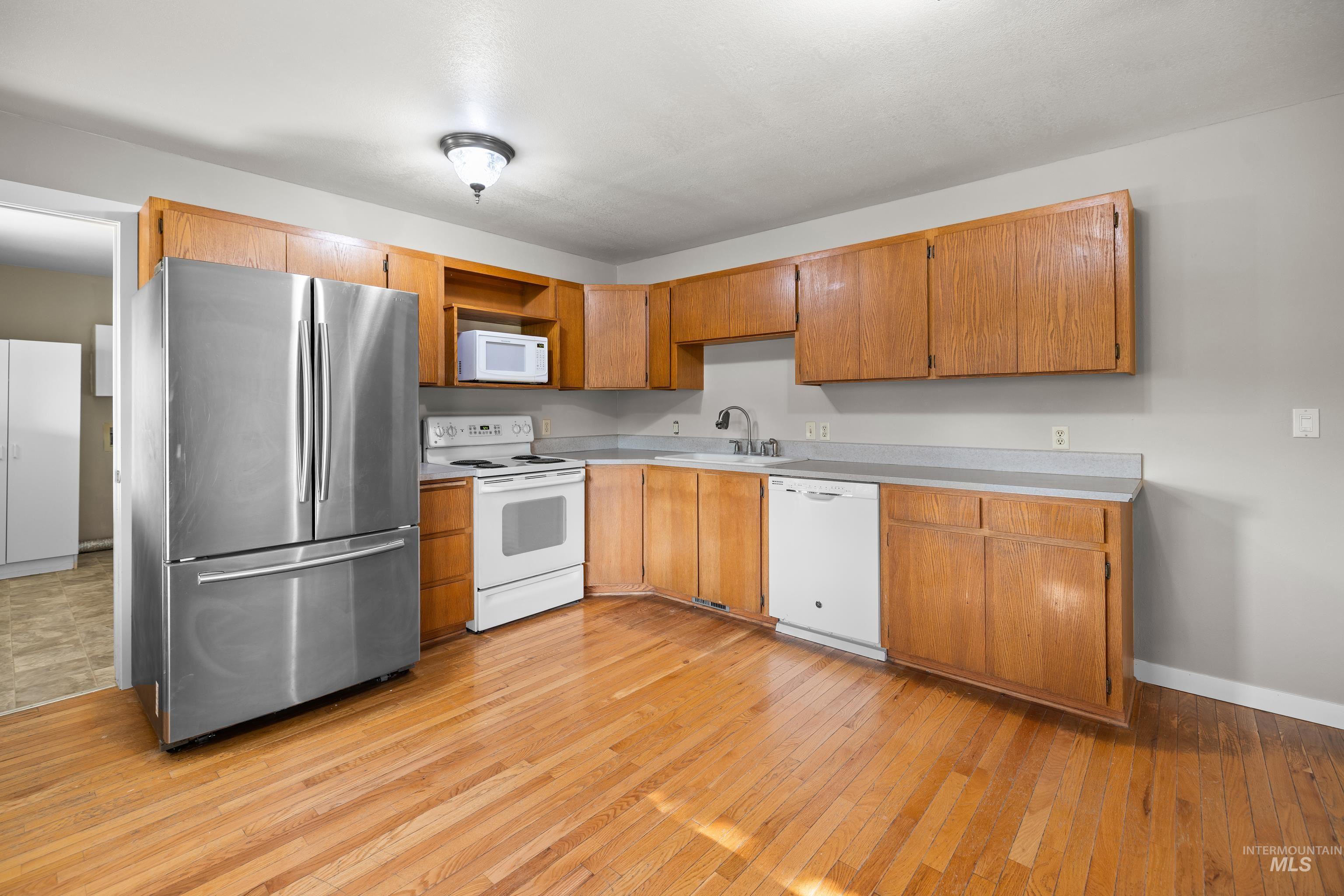 381 S Hayward Ave., Kuna, Idaho 83634, 4 Bedrooms, 2 Bathrooms, Residential For Sale, Price $389,000, 98993701
