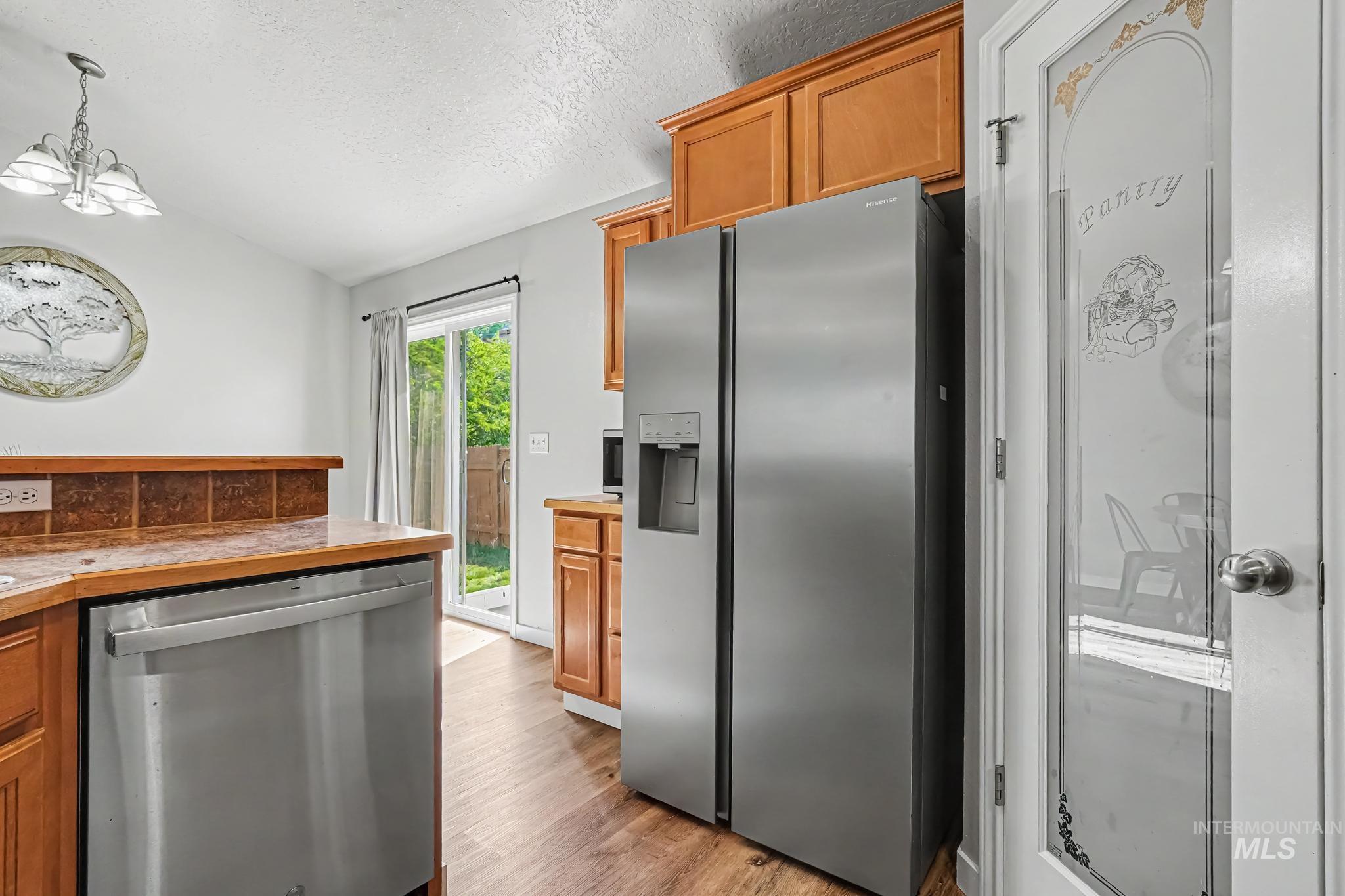 4311 N Buckboard Place, Boise, Idaho 83713, 3 Bedrooms, 2 Bathrooms, Residential For Sale, Price $430,000,MLS 98995425