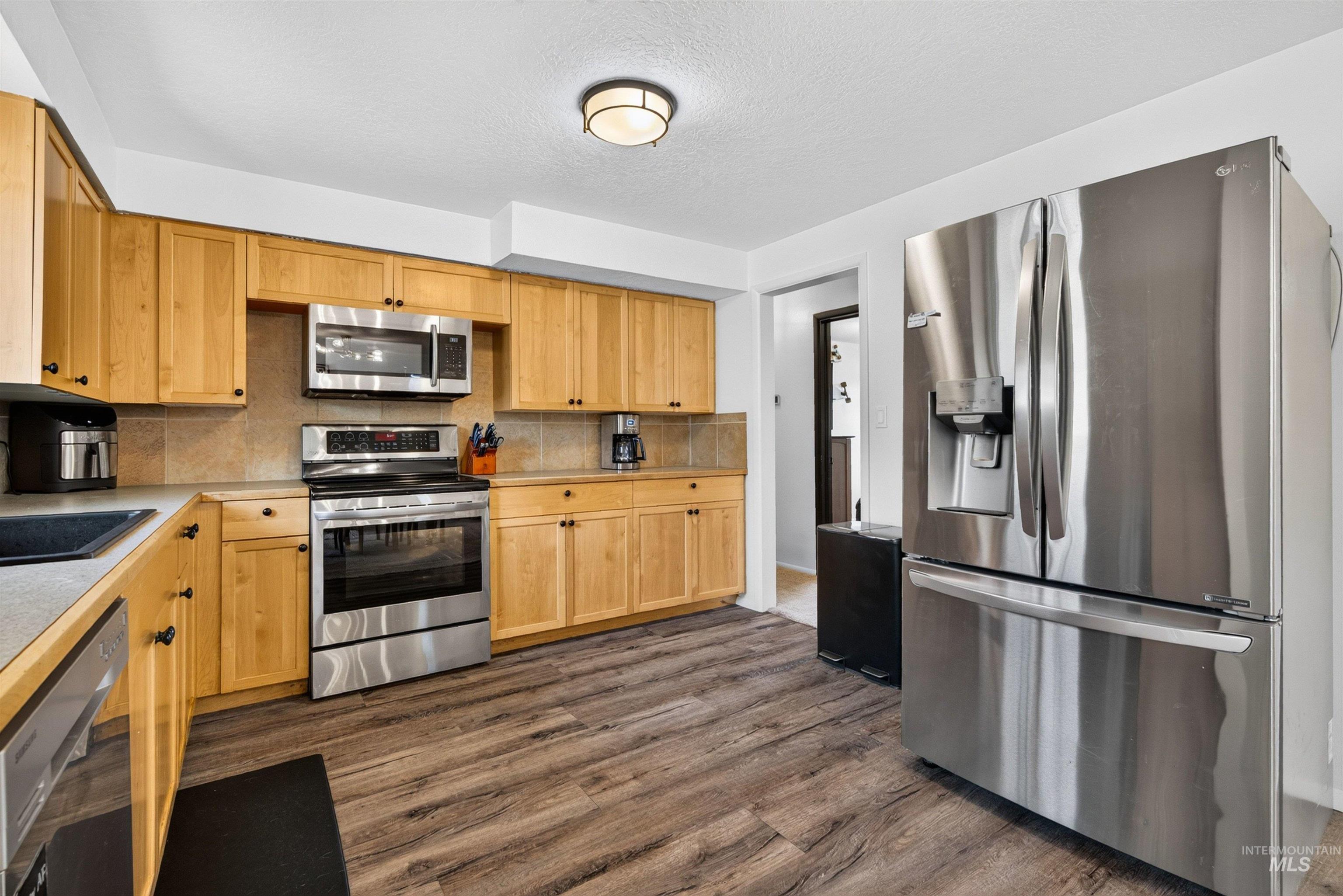 7100 W Poplar Street, Boise, Idaho 83704, 3 Bedrooms, 1.5 Bathrooms, Residential For Sale, Price $459,000,MLS 98995747