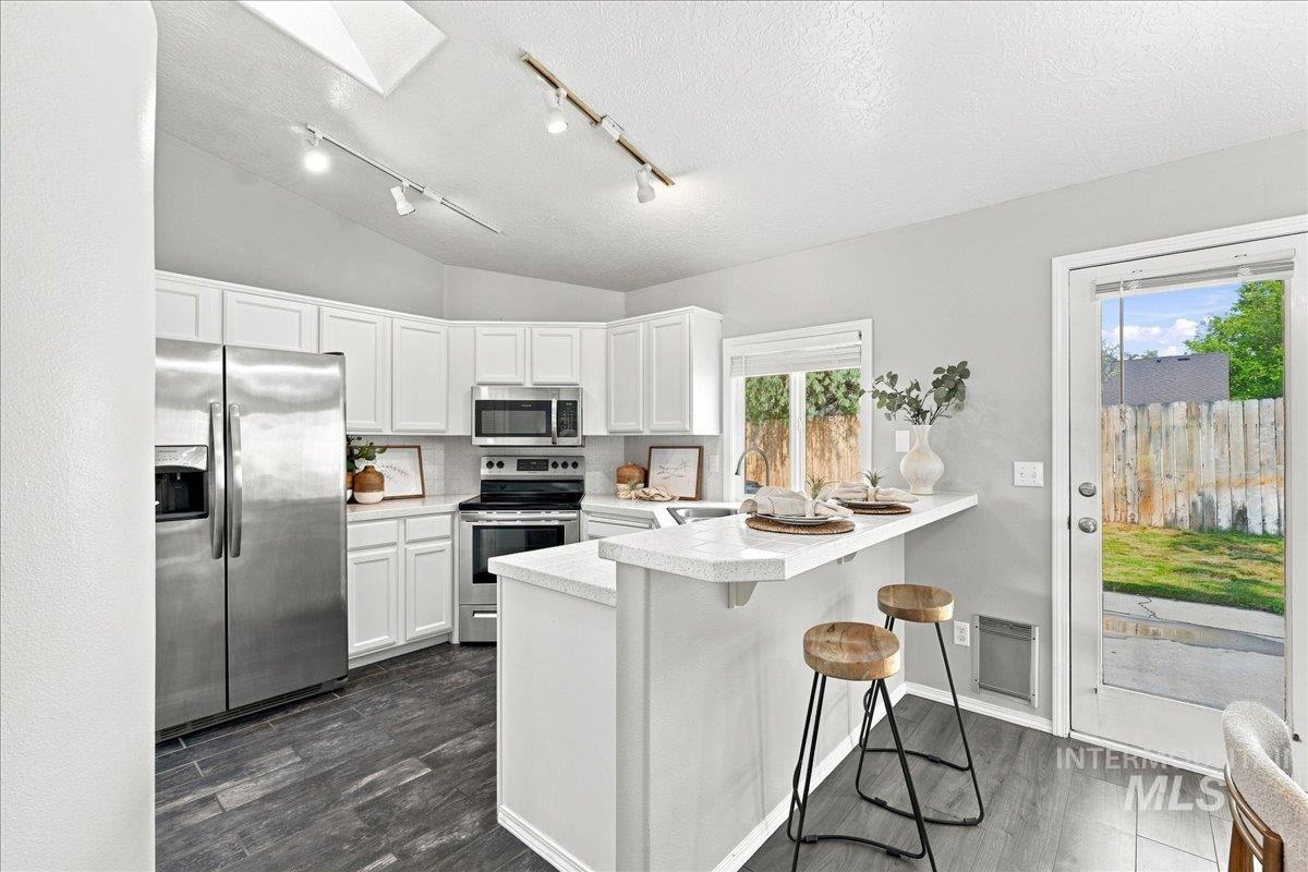4200 E Carnation Court, Boise, Idaho 83716, 3 Bedrooms, 2 Bathrooms, Residential For Sale, Price $475,000,MLS 98996430