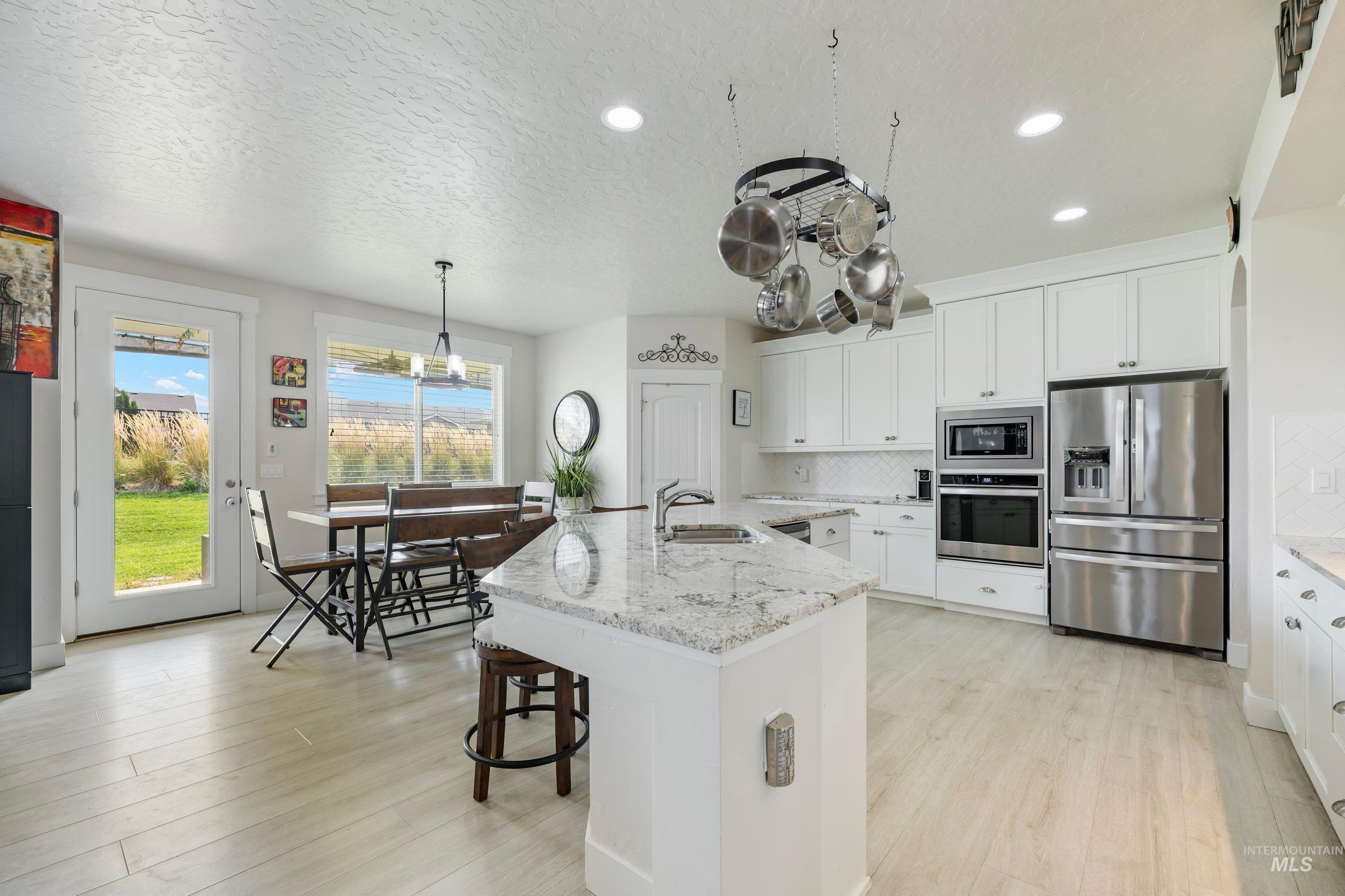 2095 N Windmill Way, Kuna, Idaho 83642, 3 Bedrooms, 3 Bathrooms, Residential For Sale, Price $599,700,MLS 98996828