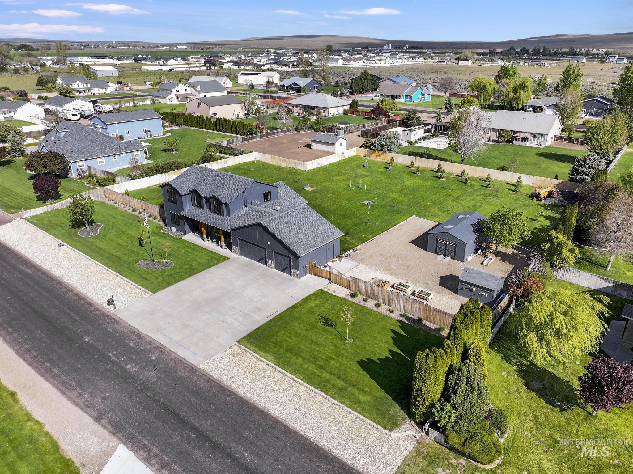 970 NW Bluegrass Circle, Mountain Home, Idaho 83647, 4 Bedrooms, 2.5 Bathrooms, Residential For Sale, Price $715,000,MLS 98996967