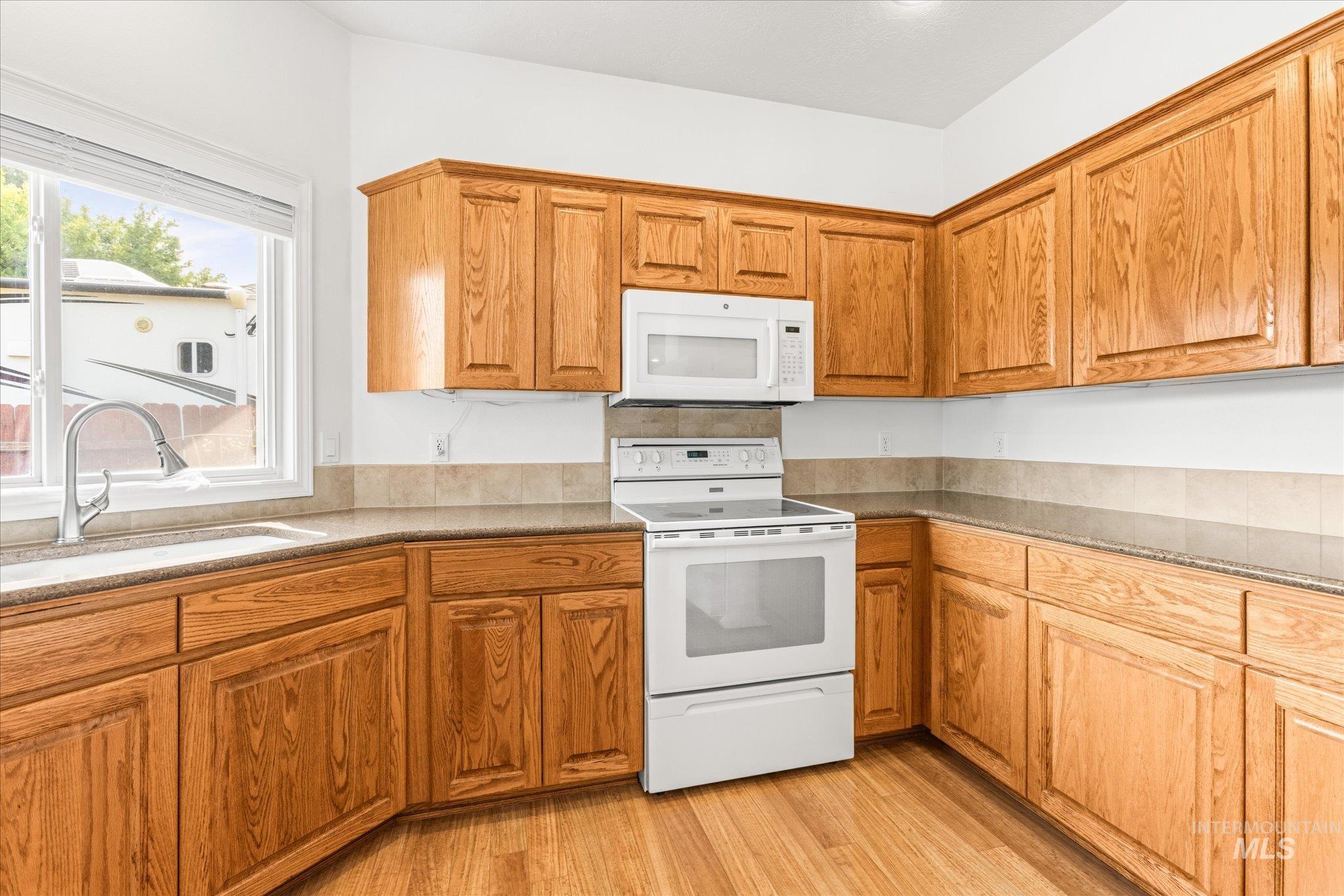 1098 E Cayman Dr., Meridian, Idaho 83642, 4 Bedrooms, 2 Bathrooms, Residential For Sale, Price $675,000,MLS 98997061