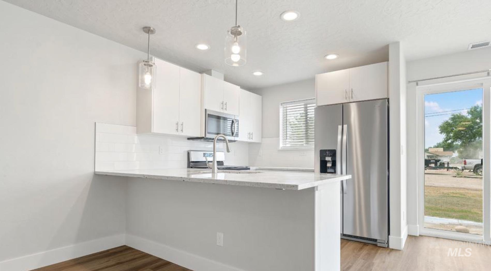 116 A&B Holly Ave, New Plymouth, Idaho 83655, 3 Bedrooms, 2.5 Bathrooms, Residential Income For Sale, Price $599,000,MLS 98997187