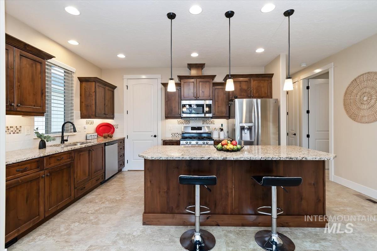 5945 W Beaufort Street, Boise, Idaho 83714, 4 Bedrooms, 2.5 Bathrooms, Residential For Sale, Price $575,000,MLS 98998407