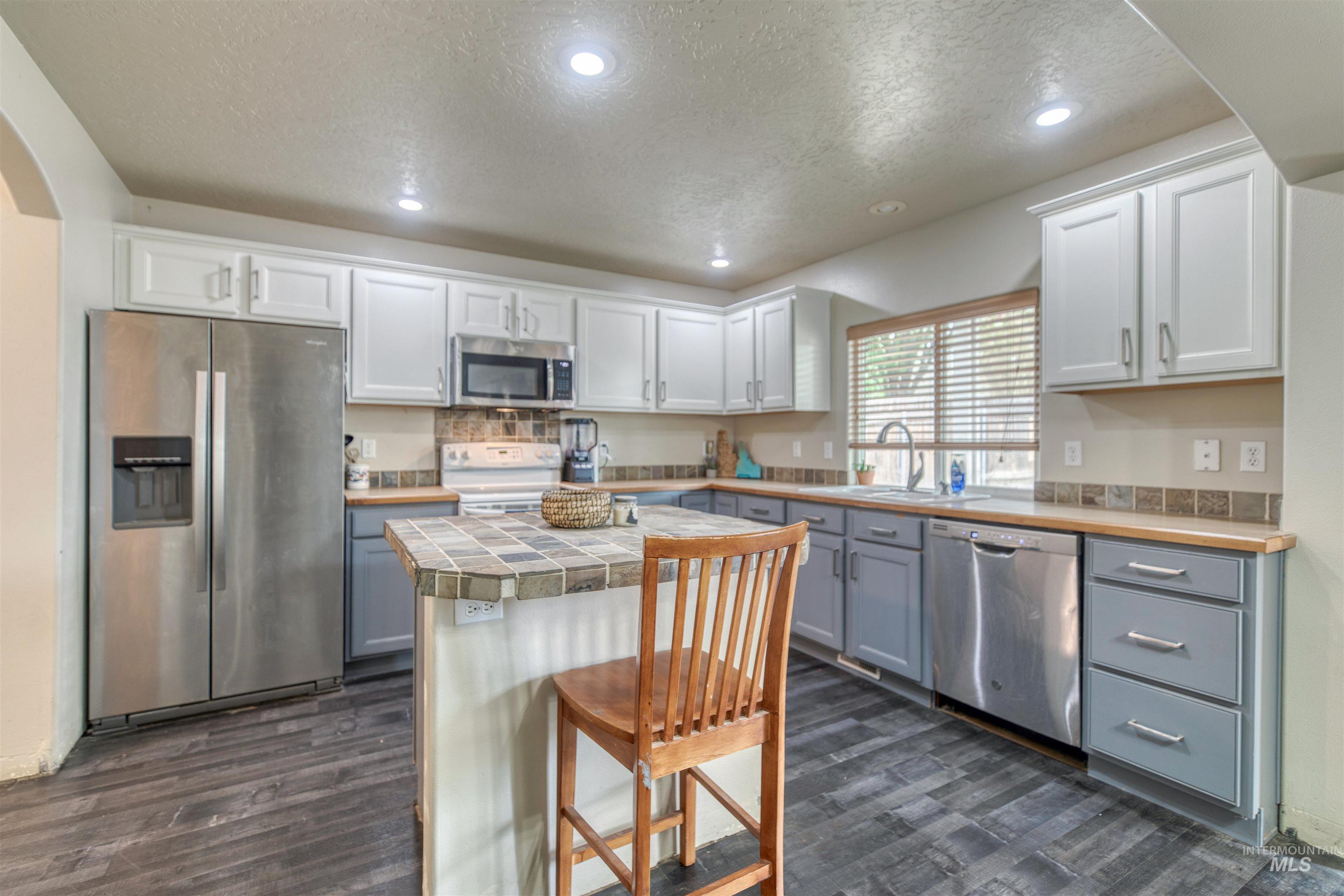5950 S Harrington Way, Boise, Idaho 83709, 4 Bedrooms, 2.5 Bathrooms, Residential For Sale, Price $475,000,MLS 98999783