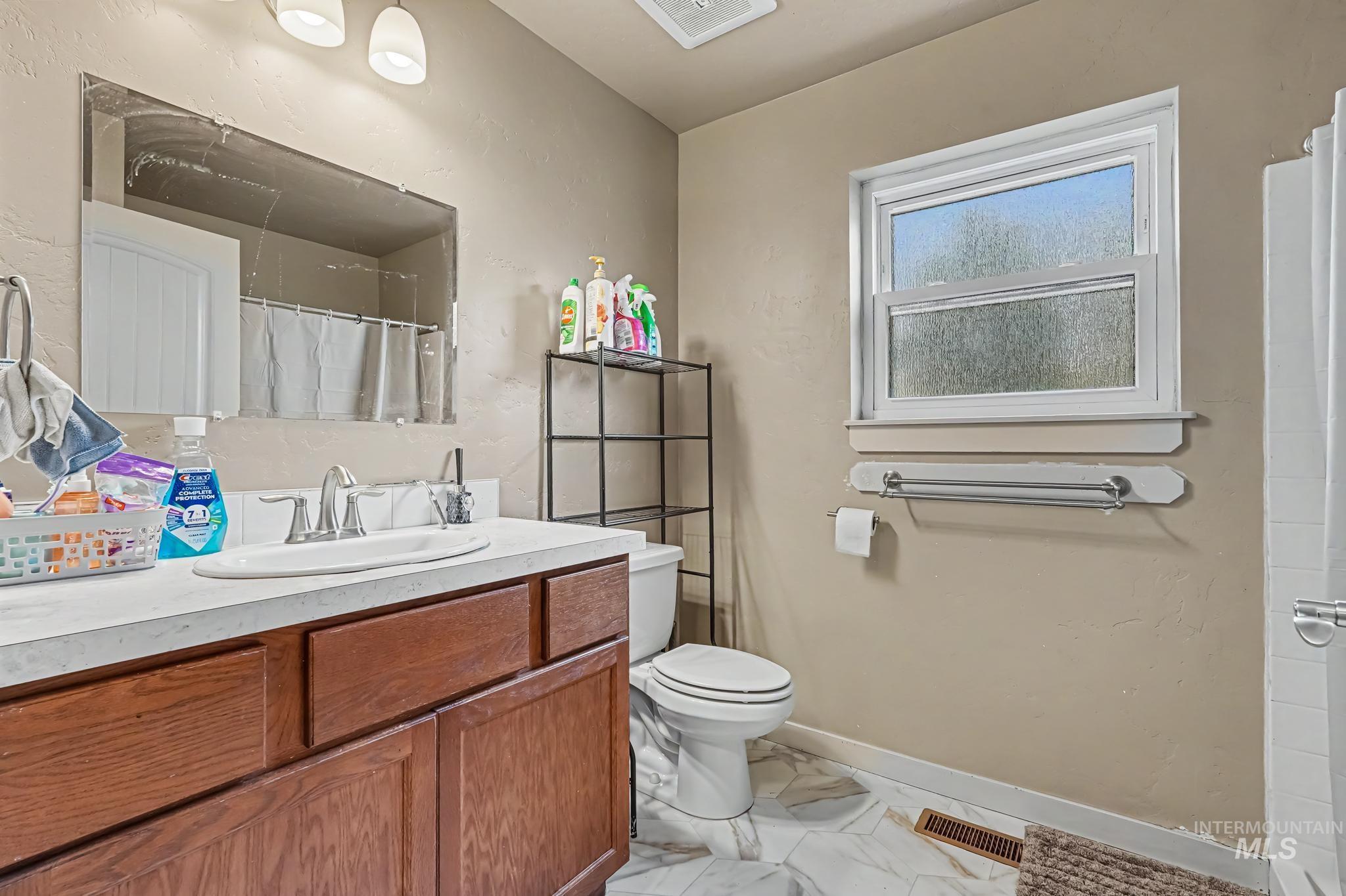 7764 Gary Ln, Boise, Idaho 83714, 4 Bedrooms, 2 Bathrooms, Residential For Sale, Price $450,000, 98999912