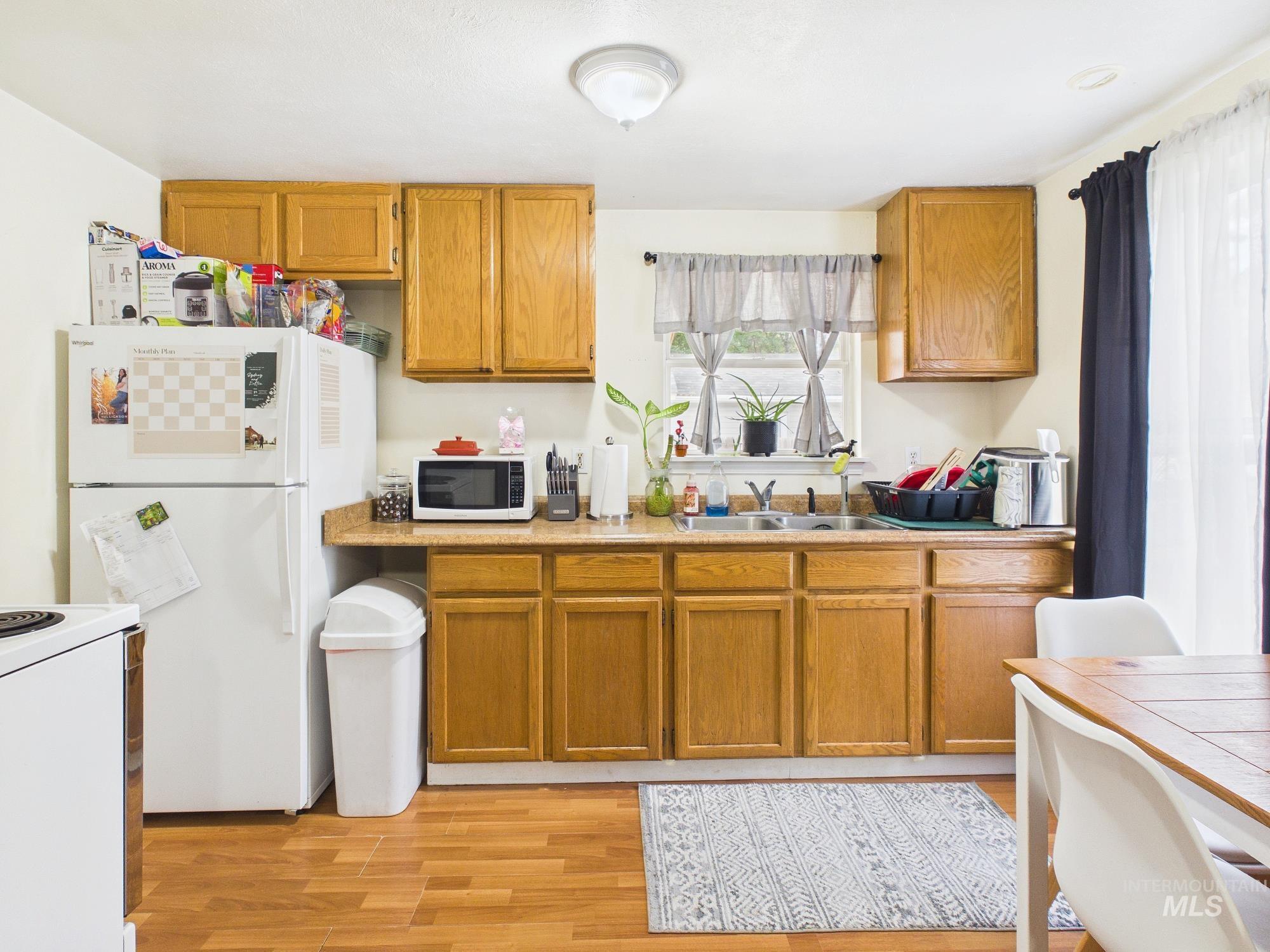 831 E 1st St & 207 S DeClark, Emmett, Idaho 83617, 3 Bedrooms, 2 Bathrooms, Residential For Sale, Price $360,000, 99001207