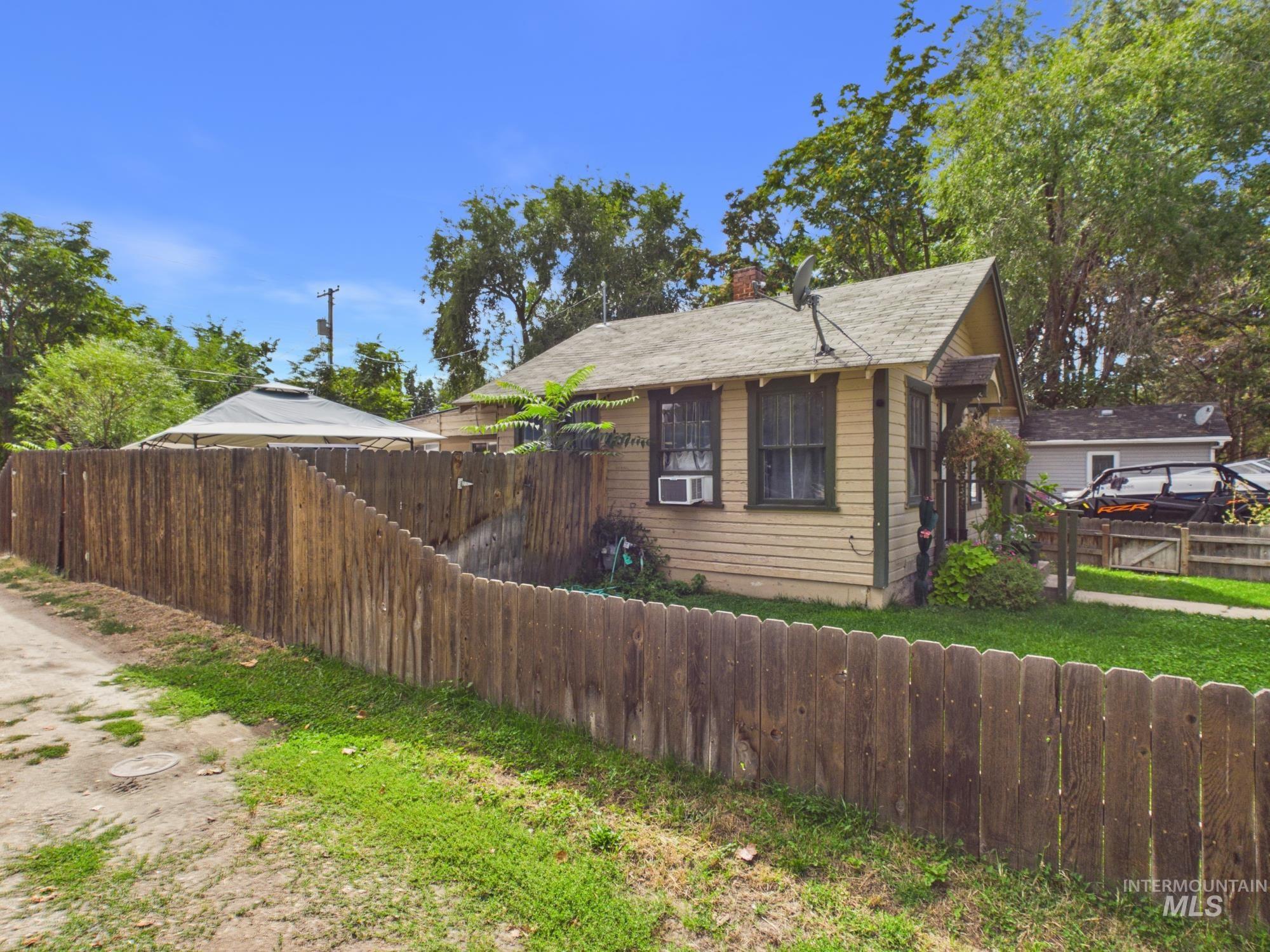831 E 1st St & 207 S DeClark, Emmett, Idaho 83617, 3 Bedrooms, 2 Bathrooms, Residential For Sale, Price $360,000, 99001207
