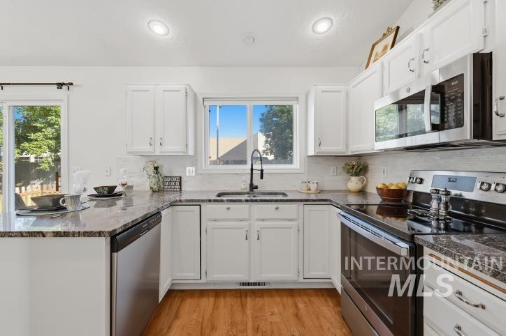 10112 W Jewell St., Boise, Idaho 83704, 3 Bedrooms, 2 Bathrooms, Residential For Sale, Price $422,500, 99001220
