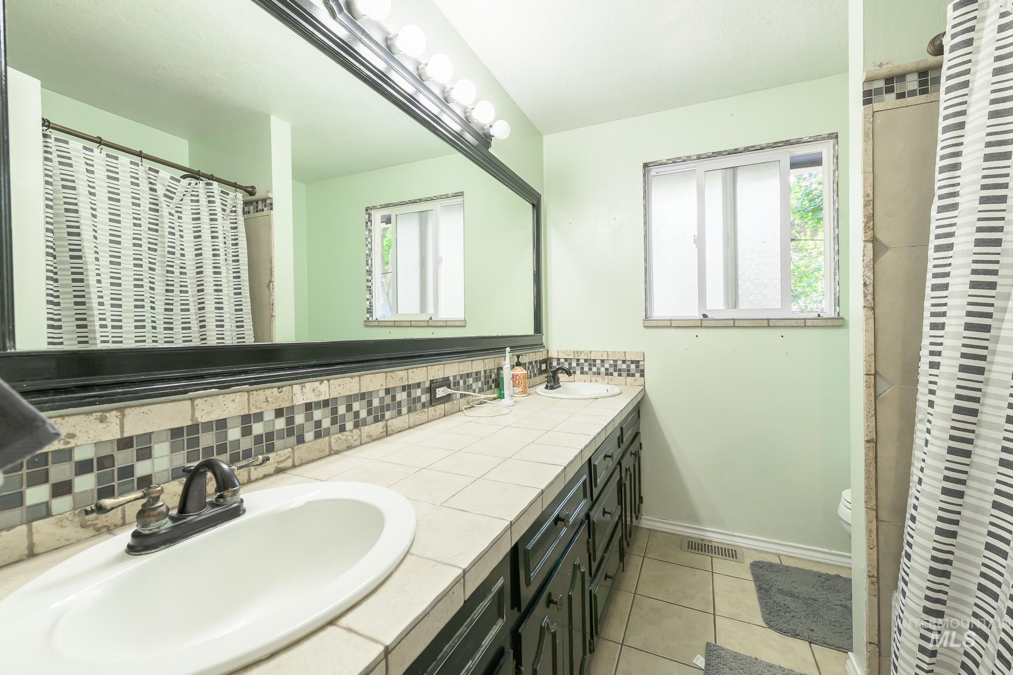 2010 N Dalton Ave, Boise, Idaho 83704, 4 Bedrooms, 2 Bathrooms, Residential For Sale, Price $469,900, 99001273