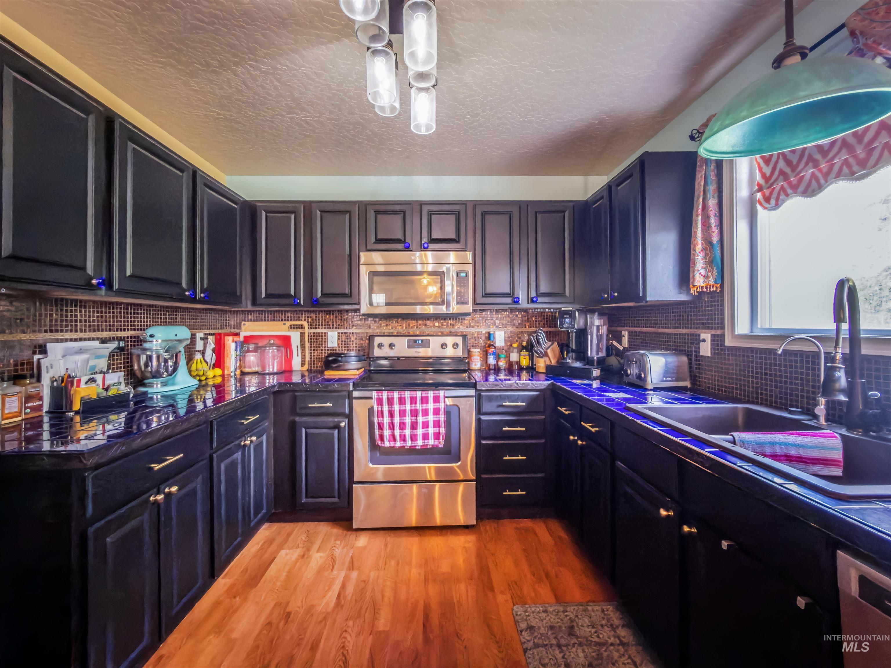 14256 Pearl Pointe Dr, Caldwell, Idaho 83607, 4 Bedrooms, 2.5 Bathrooms, Residential For Sale, Price $450,000, 99001333
