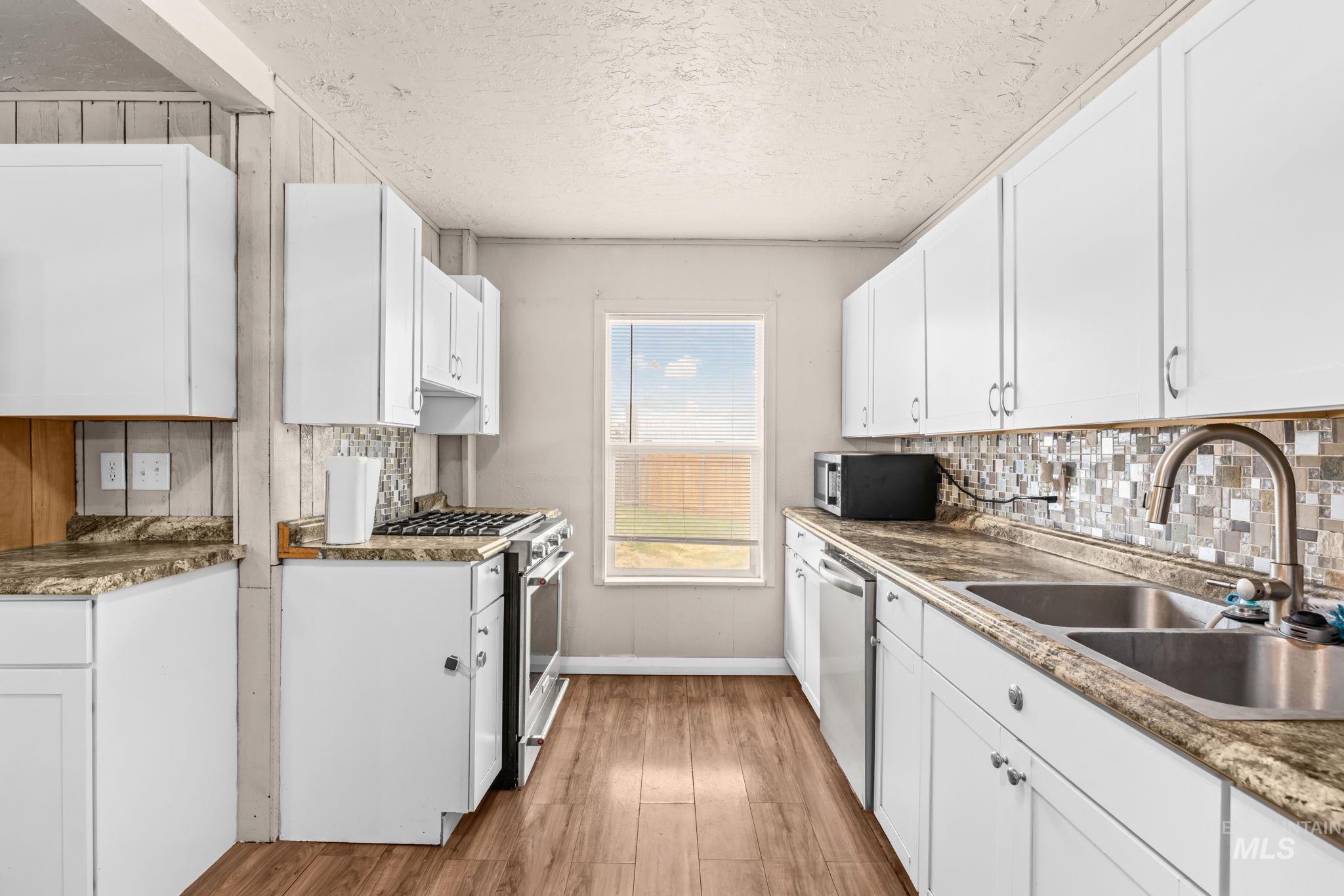 106 E 8Th, Mountain Home, Idaho 83647, 4 Bedrooms, 2.5 Bathrooms, Residential For Sale, Price $330,000,MLS 99002228