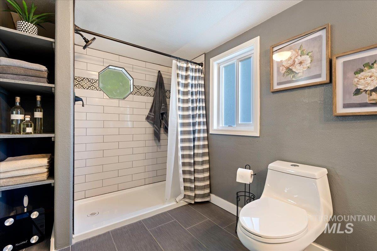 1303 N Ethridge Ln, Boise, Idaho 83704, 3 Bedrooms, 2 Bathrooms, Residential For Sale, Price $515,000, 99002655