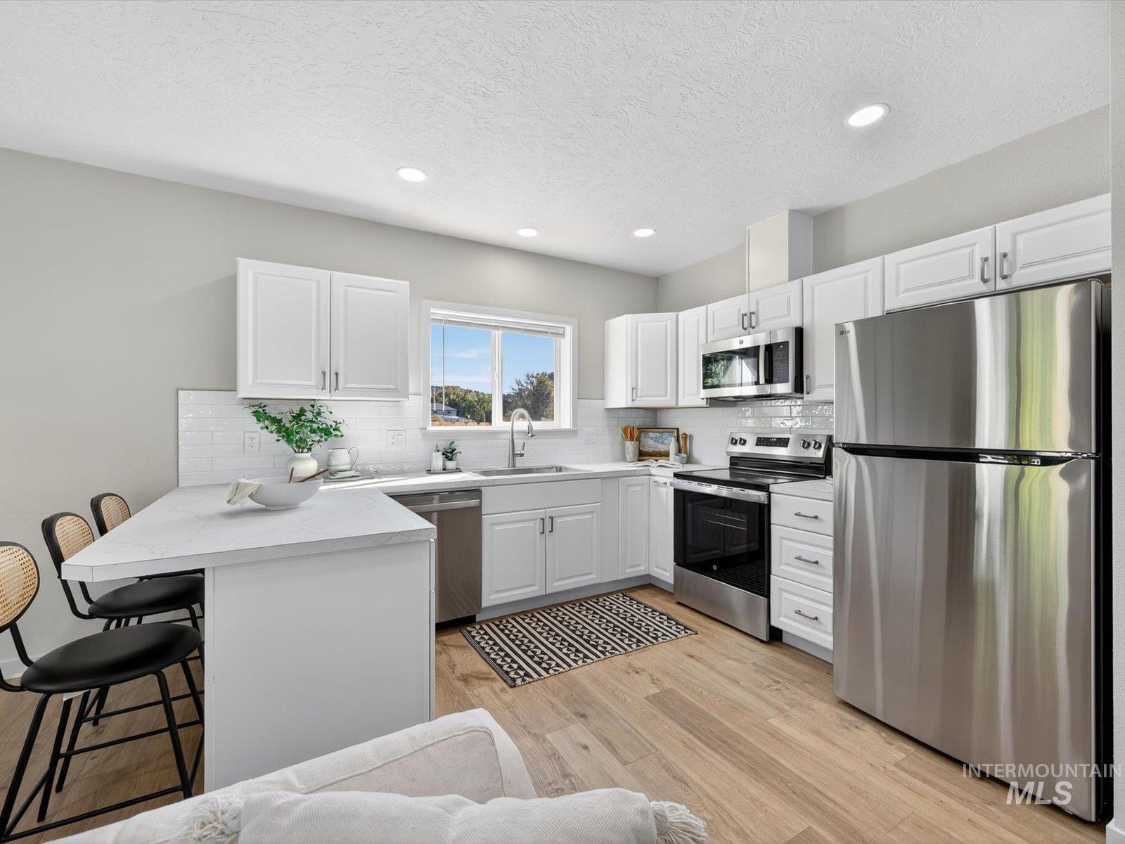 6415 W Saxton Ave., Boise, Idaho 83714, 3 Bedrooms, 1.5 Bathrooms, Residential Income For Sale, Price $629,900, 99003065