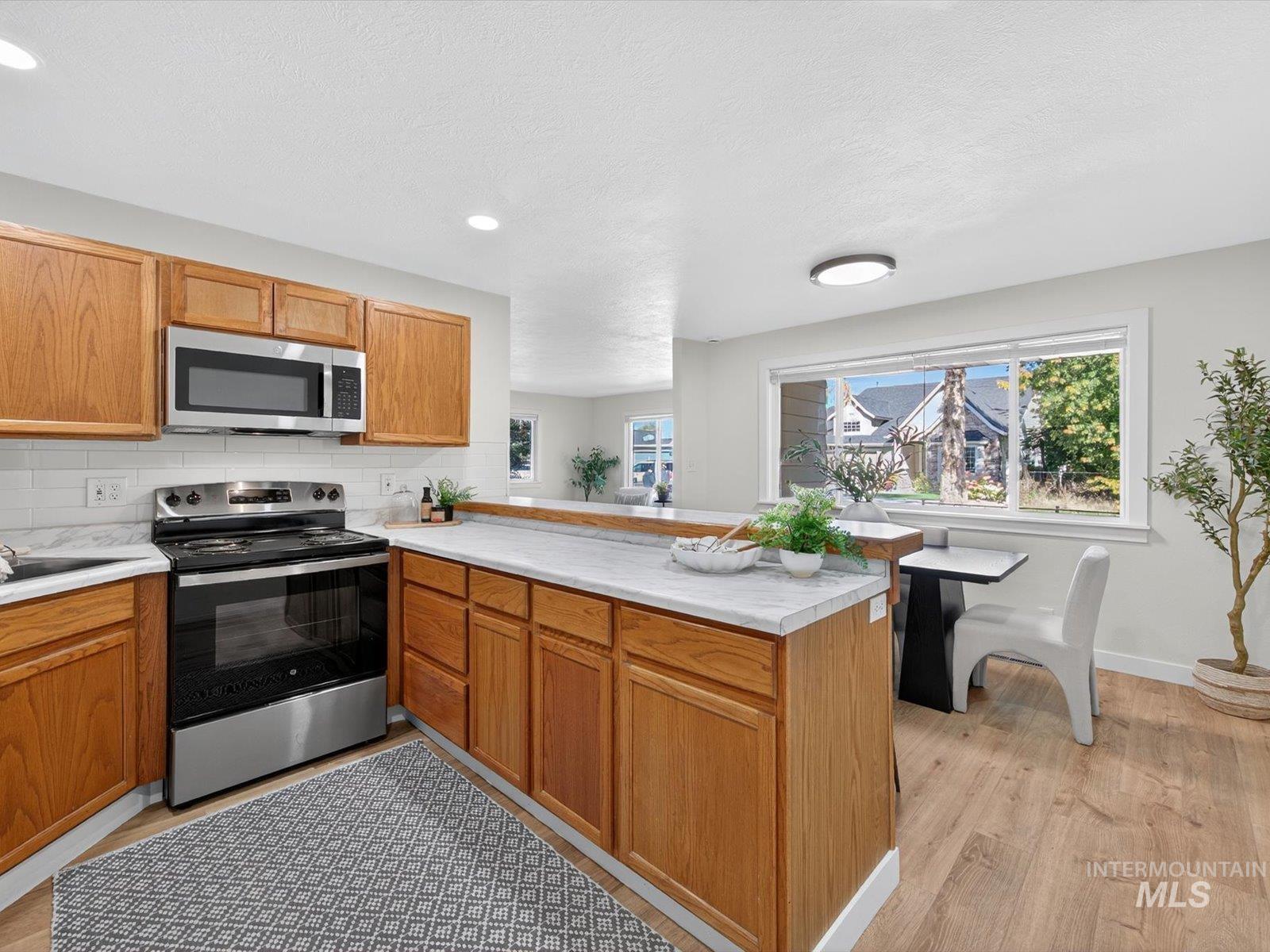 6415 W Saxton Ave., Boise, Idaho 83714, 5 Bedrooms, 3.5 Bathrooms, Residential For Sale, Price $629,900,MLS 99003066