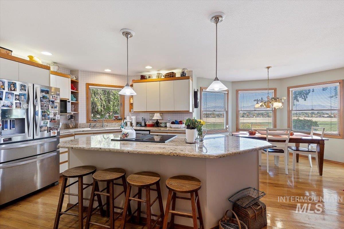 8124 W Thunder Mountain Drive, Boise, Idaho 83709, 4 Bedrooms, 2.5 Bathrooms, Residential For Sale, Price $725,000, 99004086