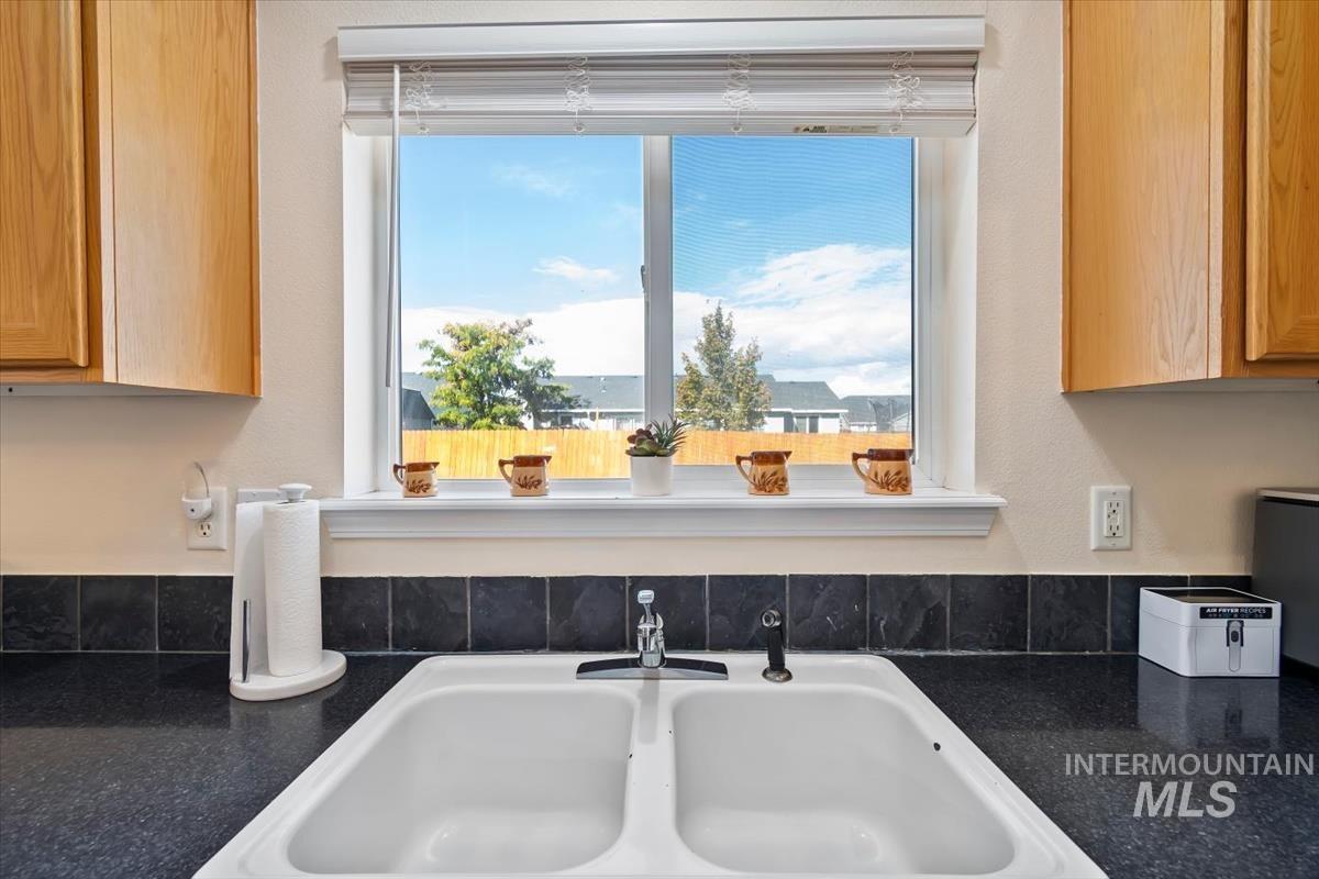 962 W 4th N, Mountain Home, Idaho 83647, 3 Bedrooms, 2 Bathrooms, Residential For Sale, Price $345,000, 99004377